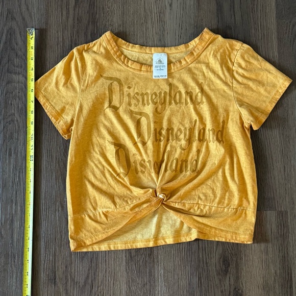 Disney Tops - Disney Disneyland Graphic Cropped Twist Front T Shirt Top‎ Yellow Size 2L